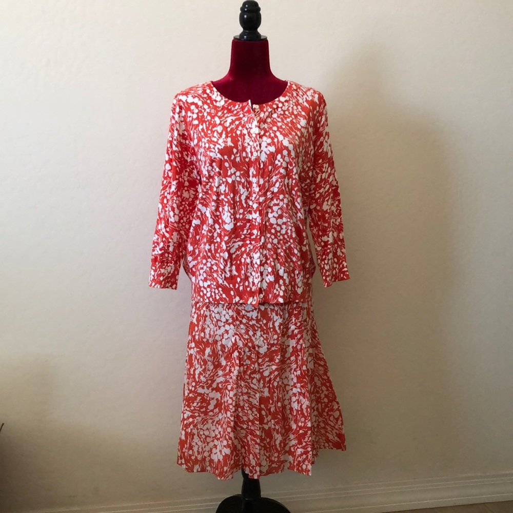 Matching cotton sweater and skirt. No rips.